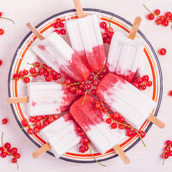 Homemade berries and coconut milk popsicles. Stock Photo by tatiana